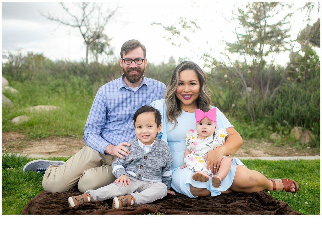 Family of four with six month old baby girl